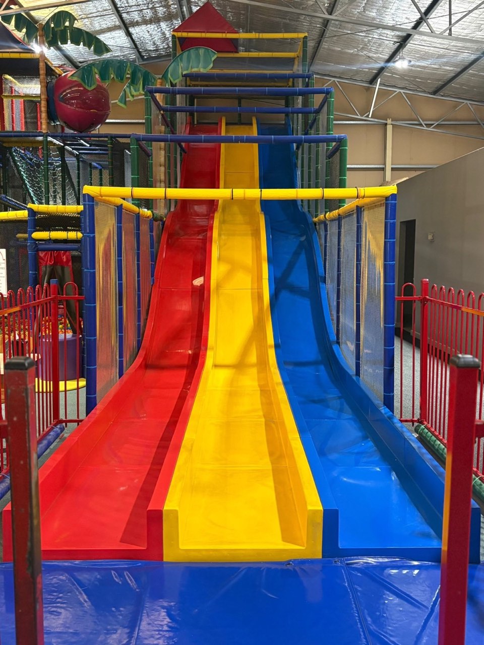 The Astro Slide — Rumble Tumbles' signature tall multi-lane slide