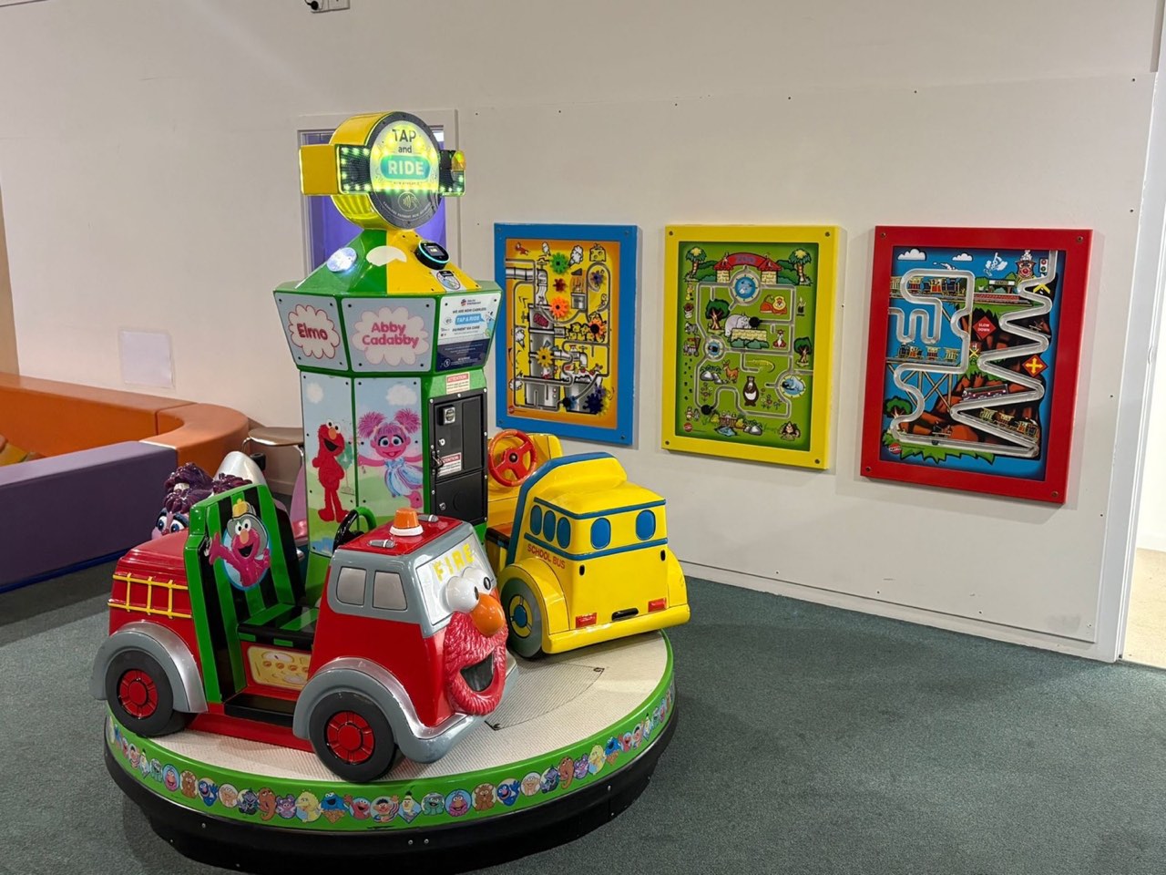 Sesame Street themed coin-operated toddler ride at Rumble Tumbles